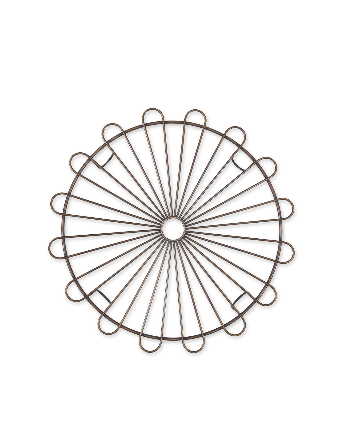 Antqiue looking brass cake rack stock image.