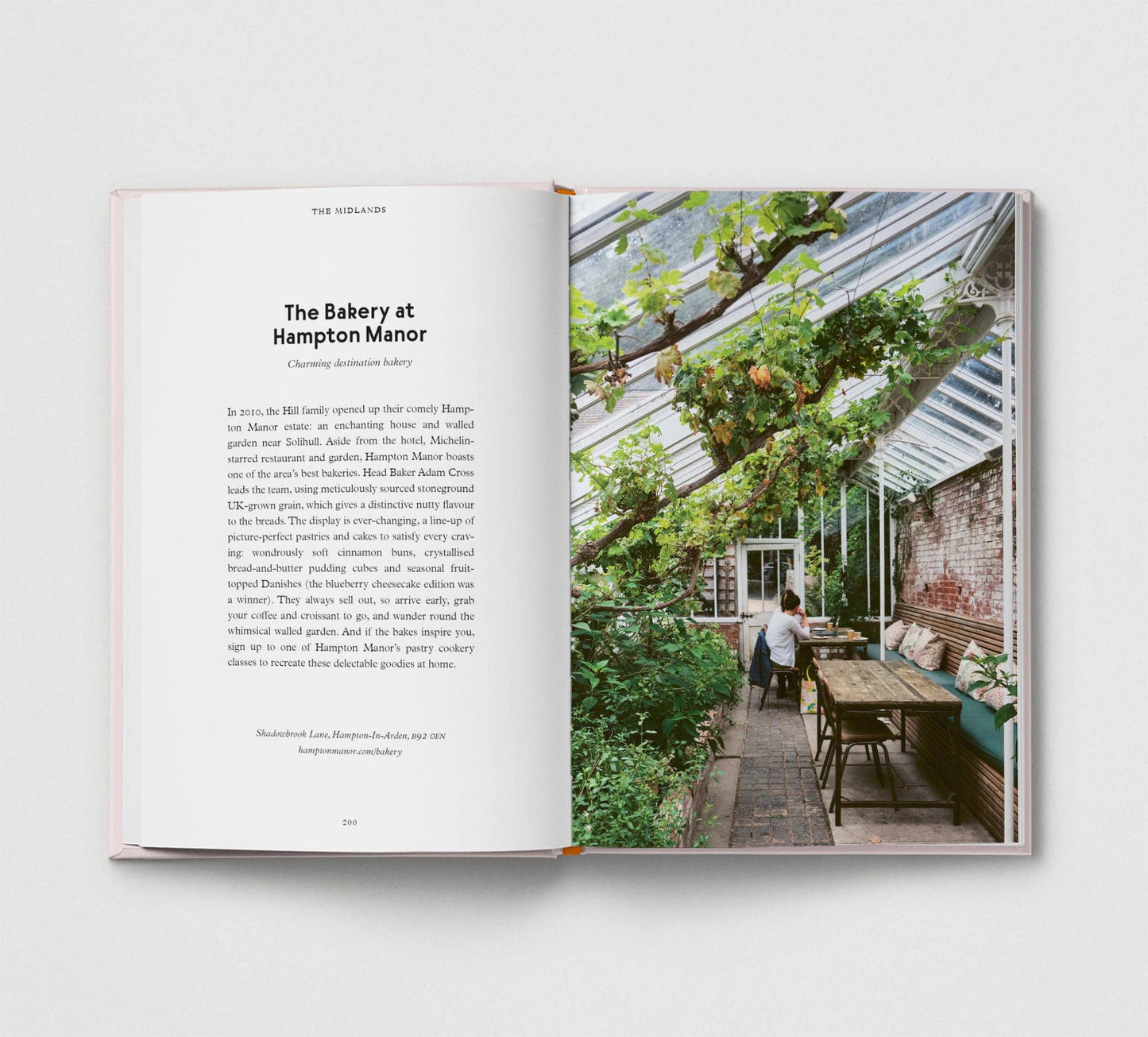 Open book showing a photo of a bakery exterior with text on a white background.