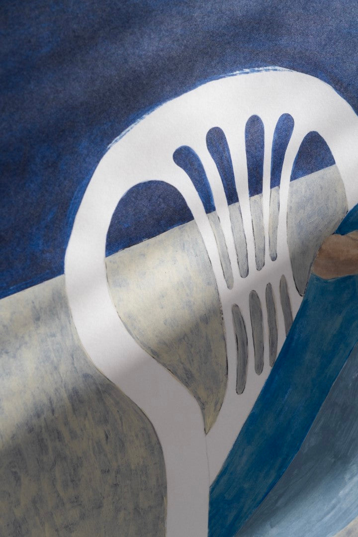 Close up of a poster featuring a blue figure lounging on a white chair.