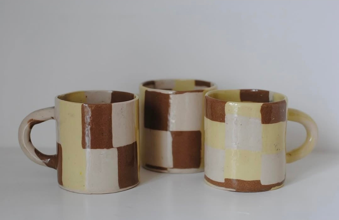 Fern Taylor Check Mug in yellow and brown, three handmade stoneware mugs grouped together