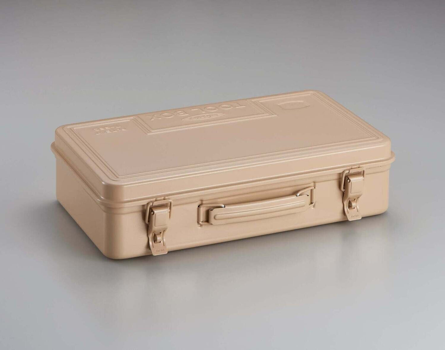 Toyo Toolbox T-360 in beige against a grey background.