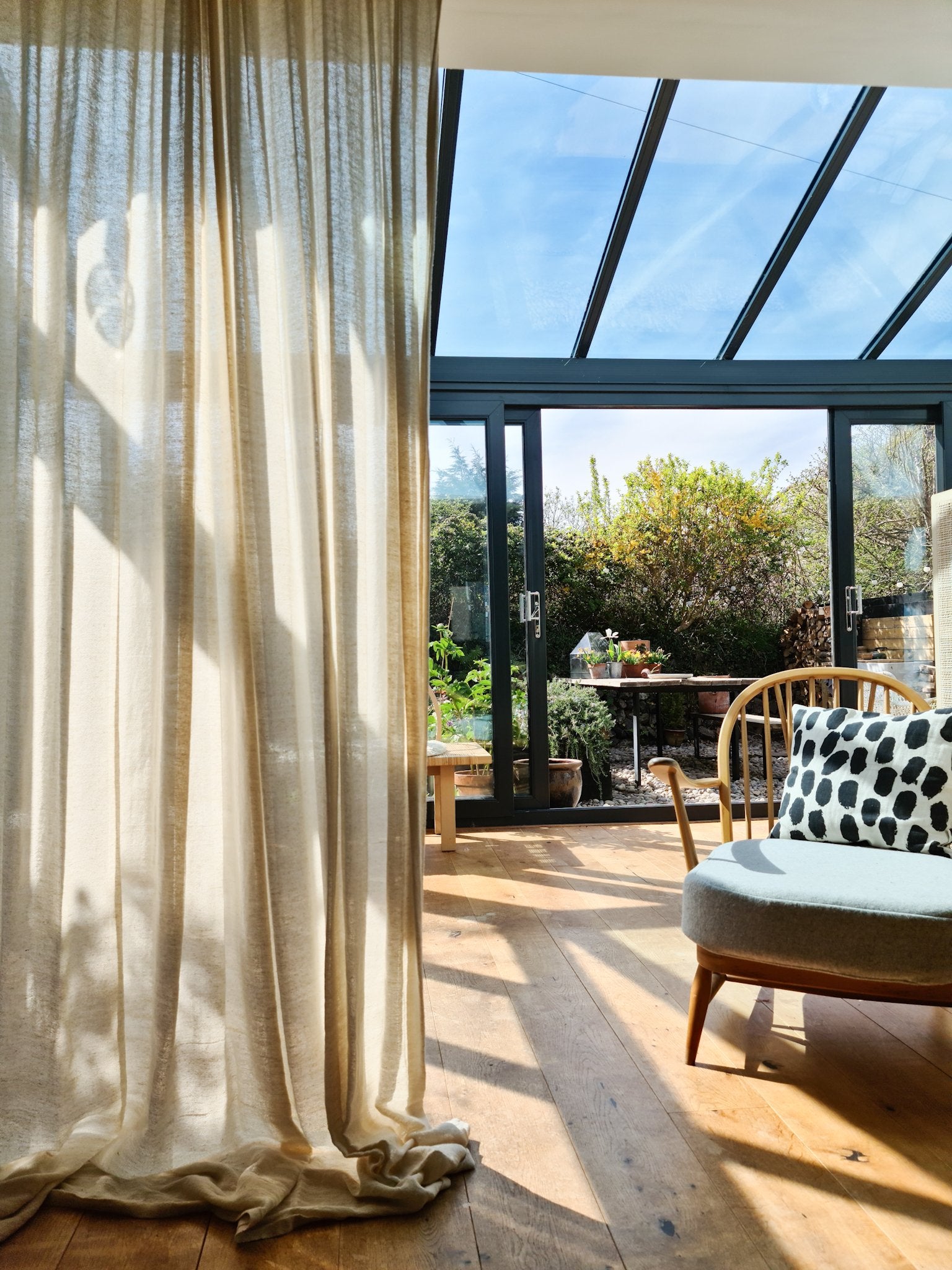 Dust sheet curtains, serious budget styling.