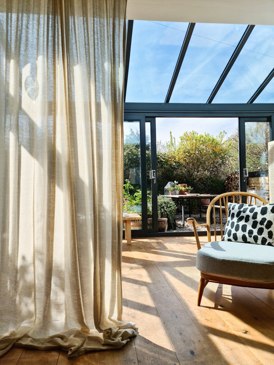 Dust sheet curtains, serious budget styling.