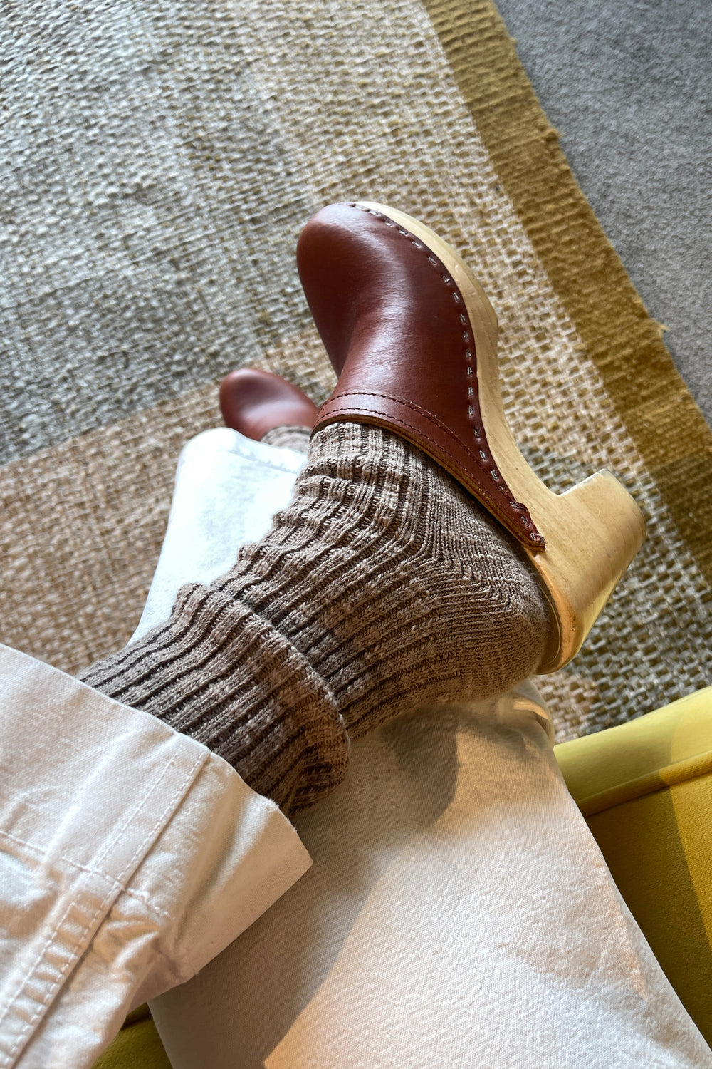 Le Bon Shoppe Cottage Socks in Flax worn with tan leather clogs and white trousers