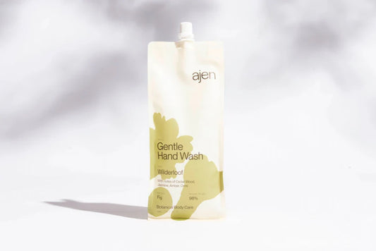 Ajen Gentle Hand Wash bottle on a light gray background.