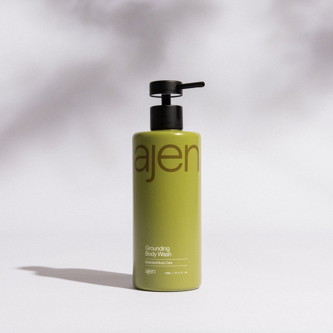 Ajen staineless steel green bottle Green bottle against a light gray background.