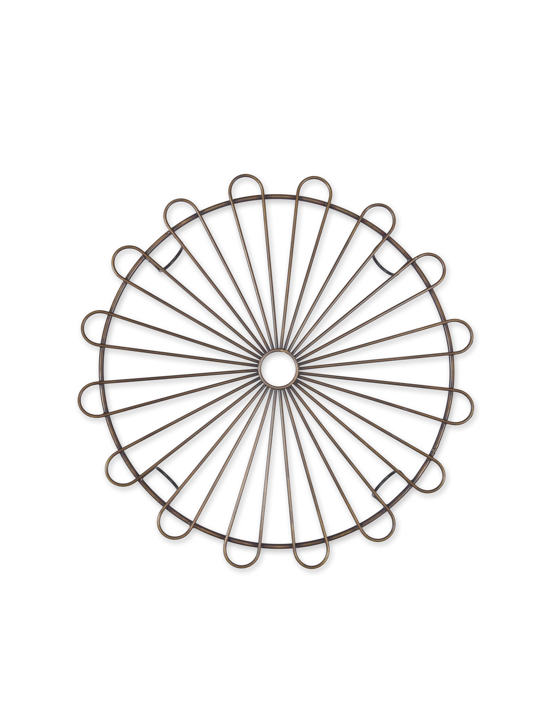 Antqiue looking brass cake rack stock image.