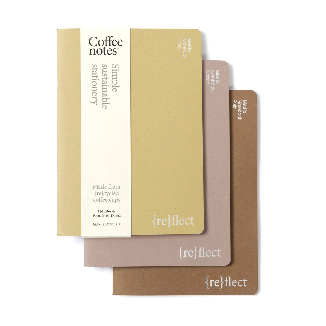 Set of three notebooks with 'reflect' branding on a white background.