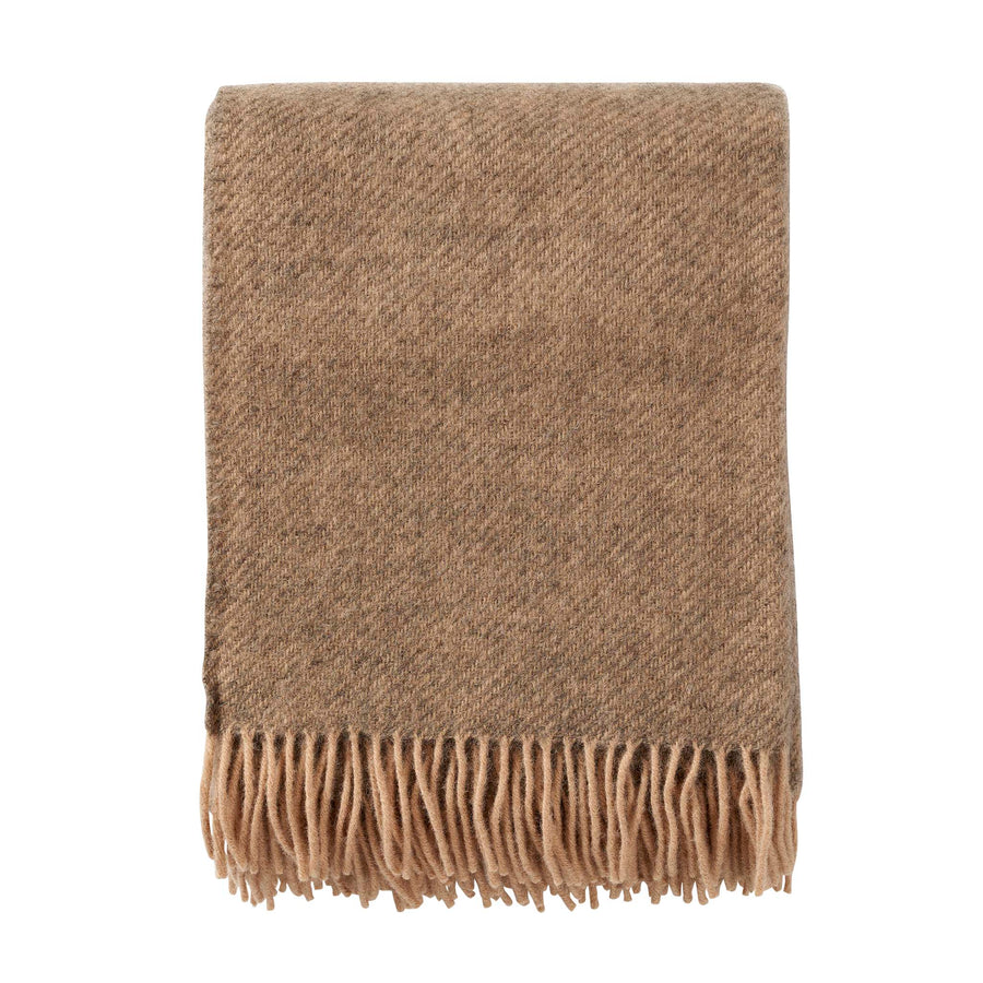 Gotland beige wool stock image against a white background.