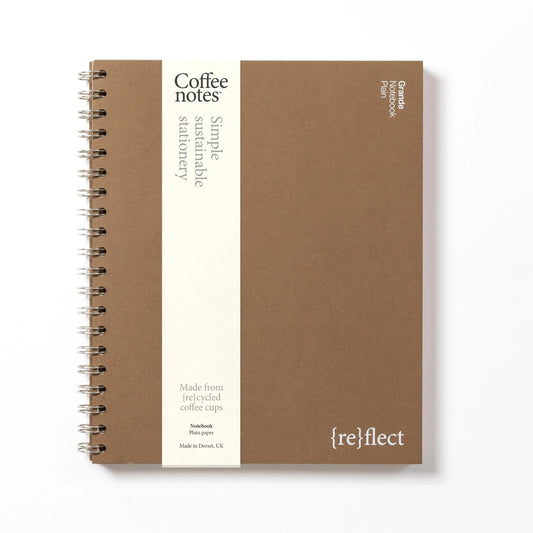 Sustainable notebook made from recycled coffee cups with visible branding on a white background.