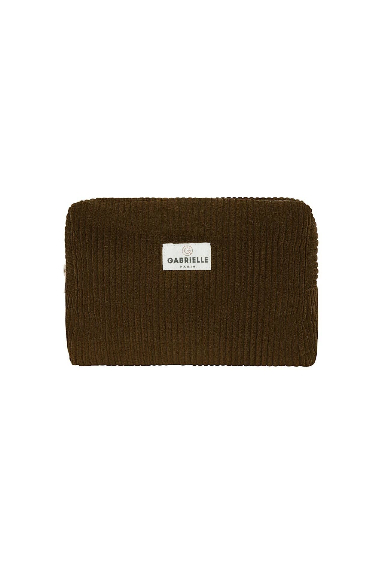 Olive velvet corduroy toiletry bag against a white background.