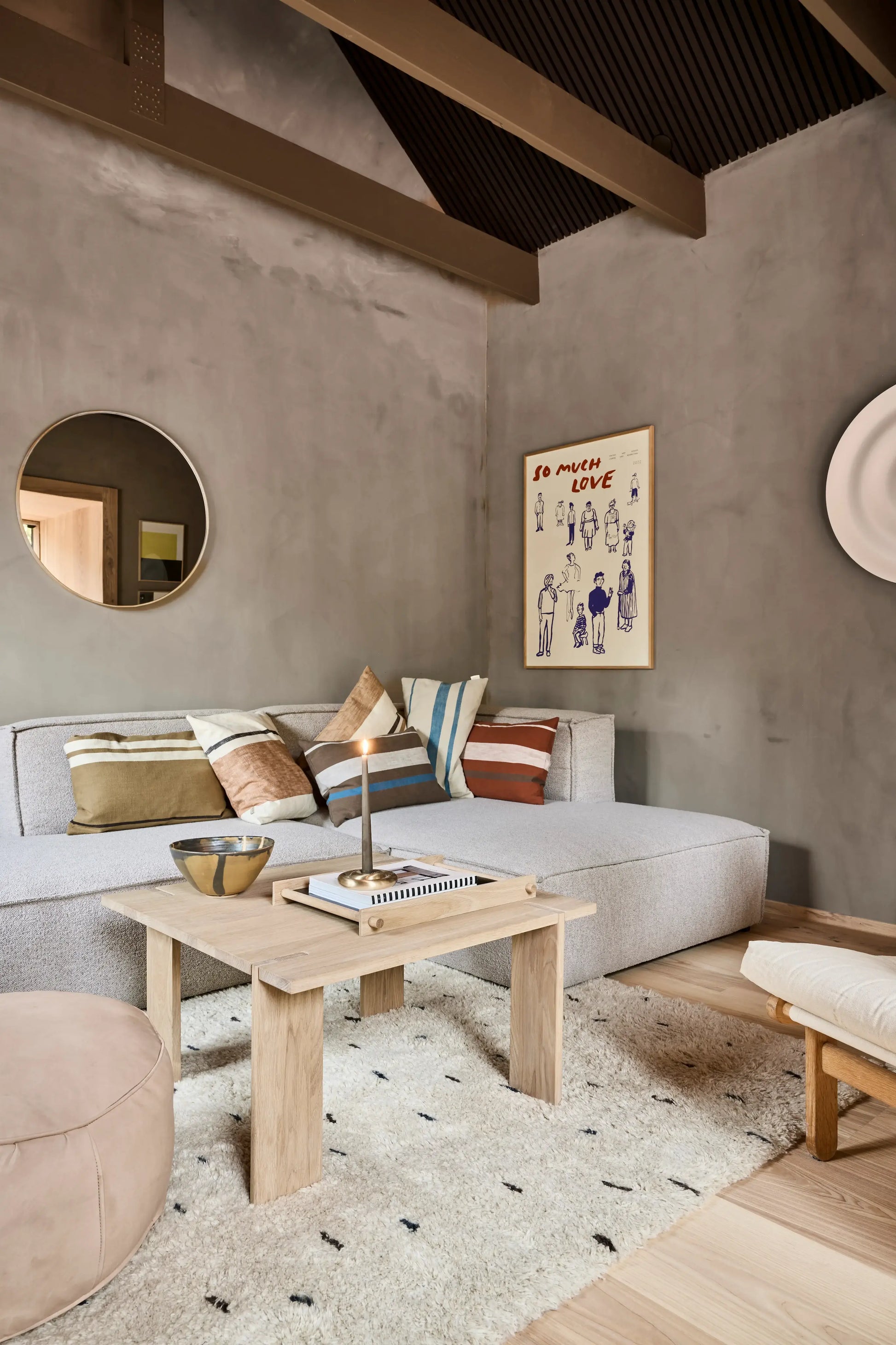OYOY Square Coffee Table in solid oak in living room with grey sofa, striped cushions and Berber rug