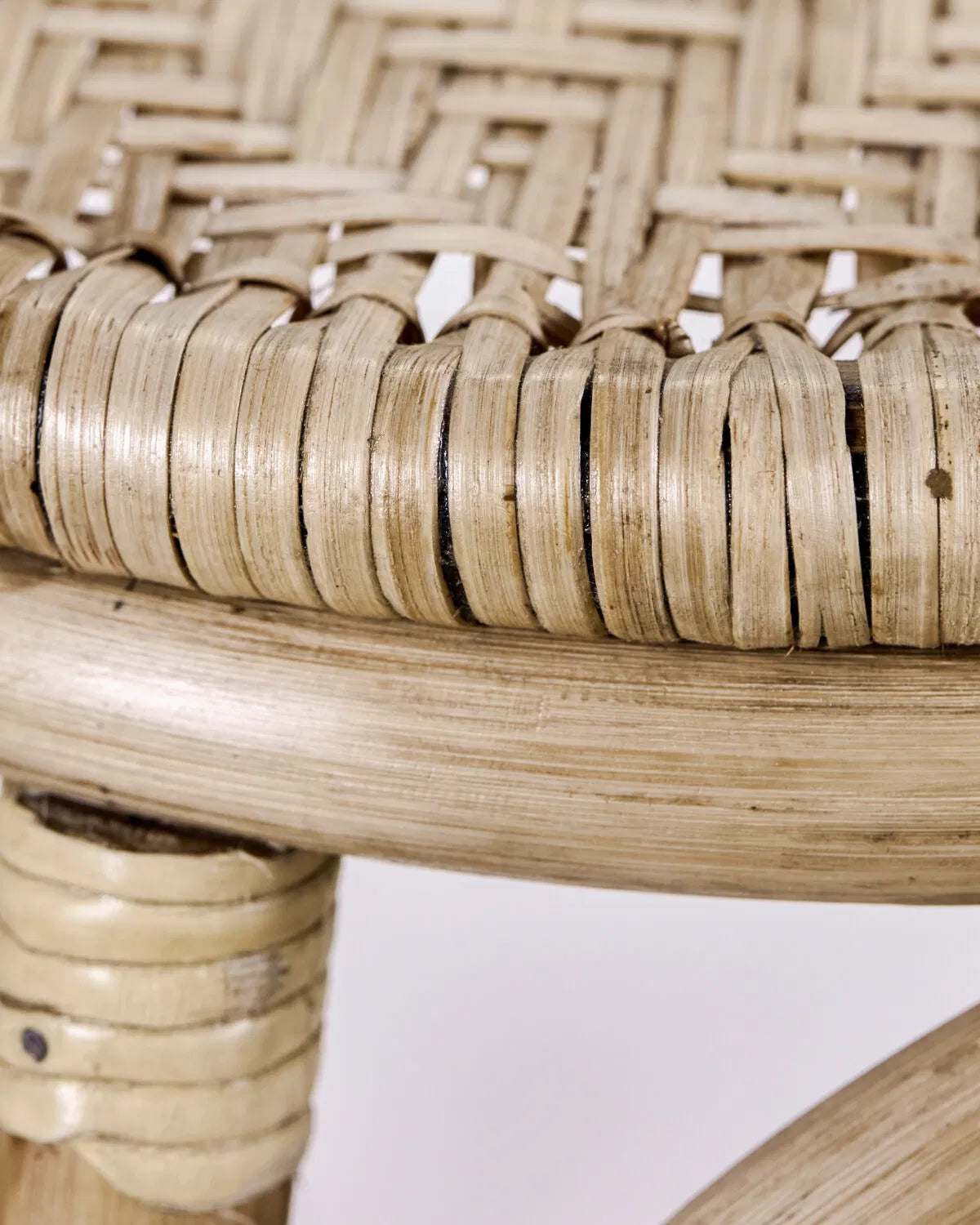 Close up of the detail of a Trenza Rattan Stool.