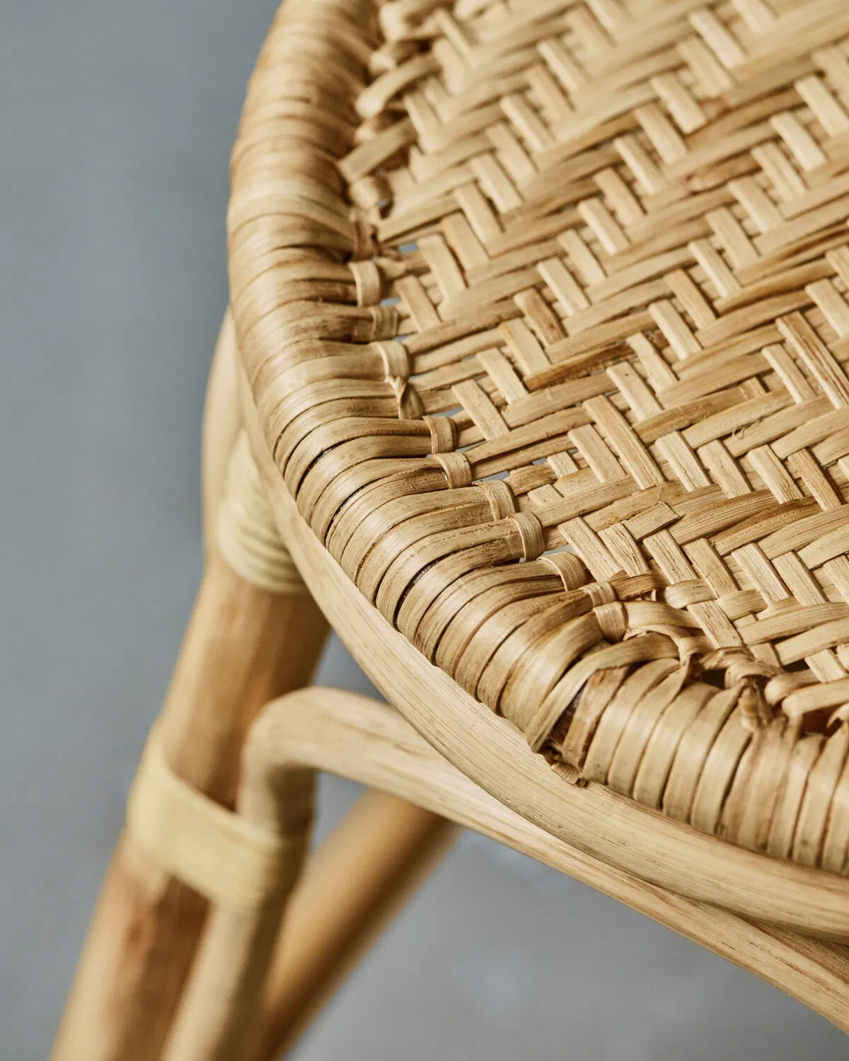 Close up of the detail of a Trenza Rattan Stool.