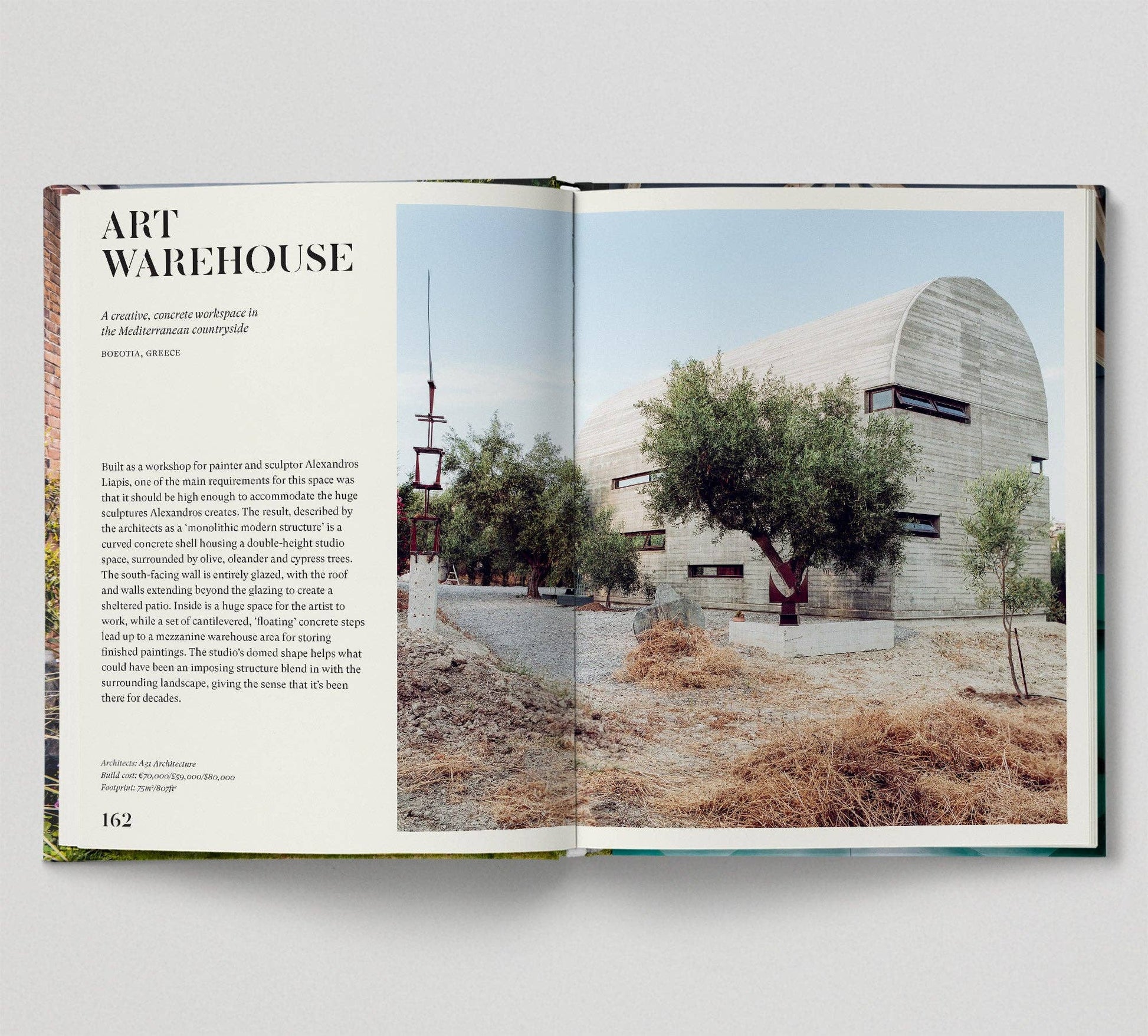 Open book showing an architectural photograph of a building with text on a white background.