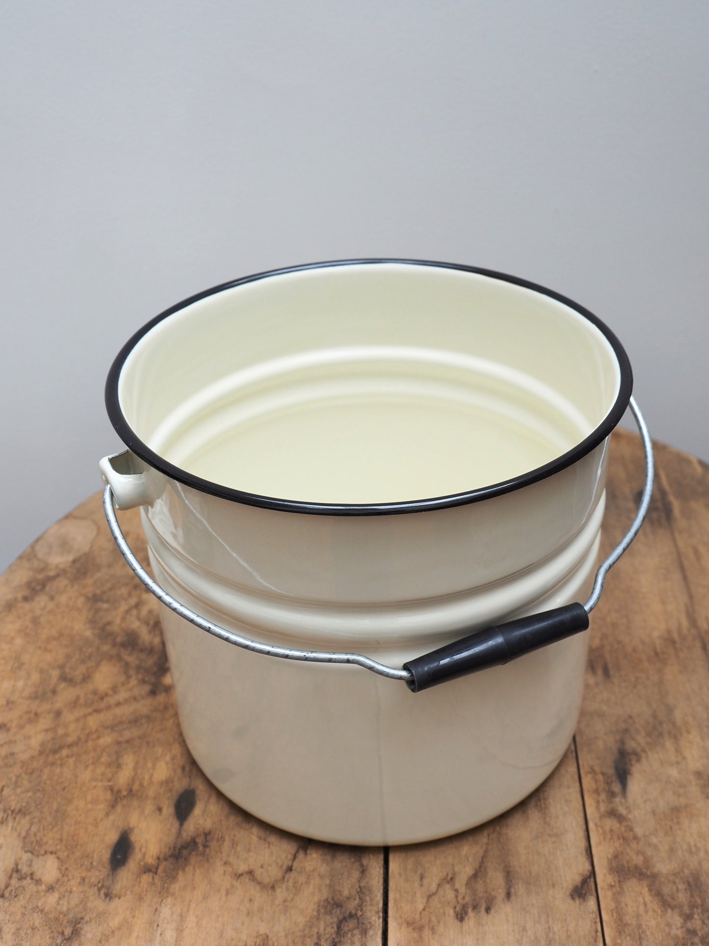 Strömshaga Emil's enamel bucket 12L open showing cream interior and black rim detail