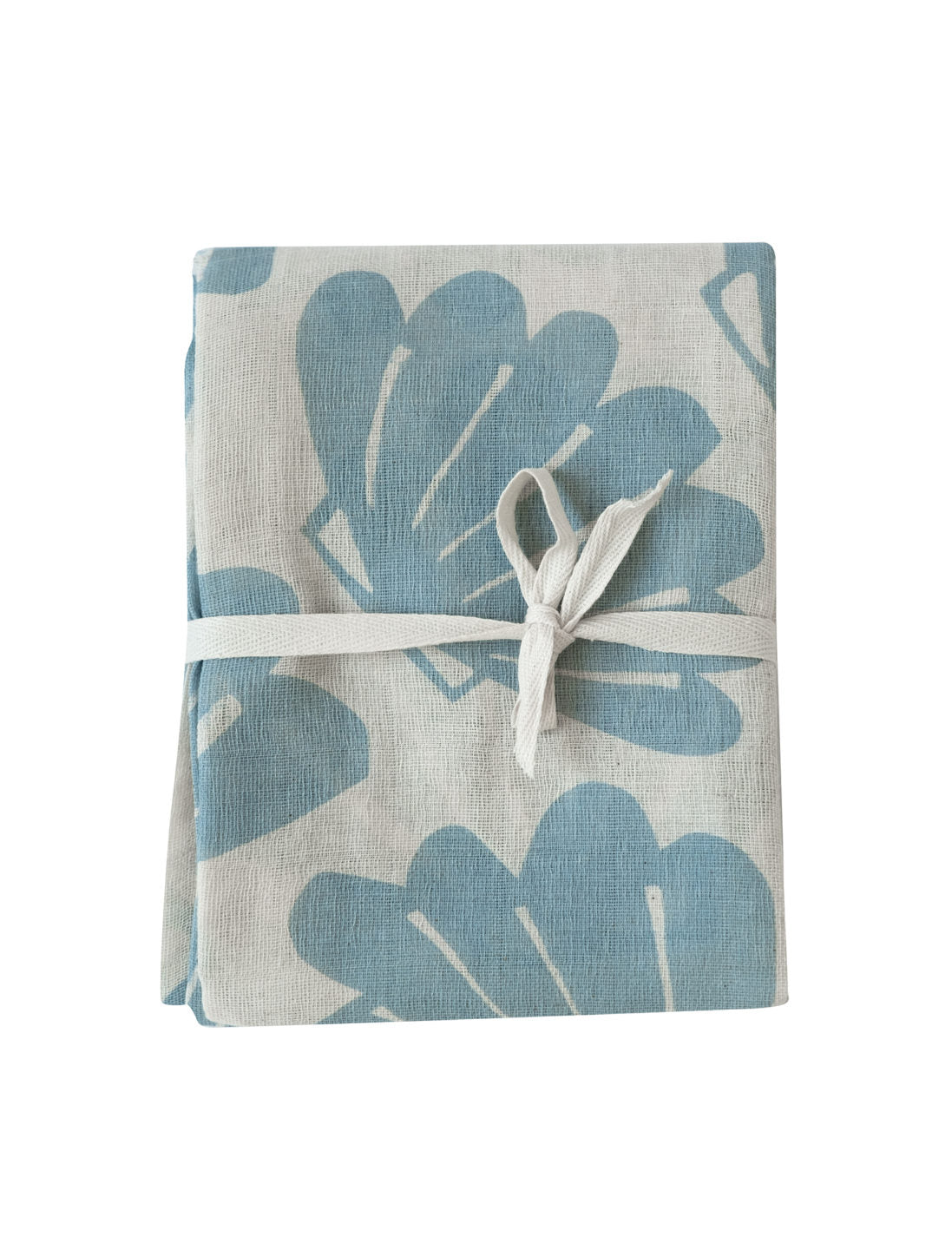Folding up aqua snacka blanket featuring a shell pattern on a white background.