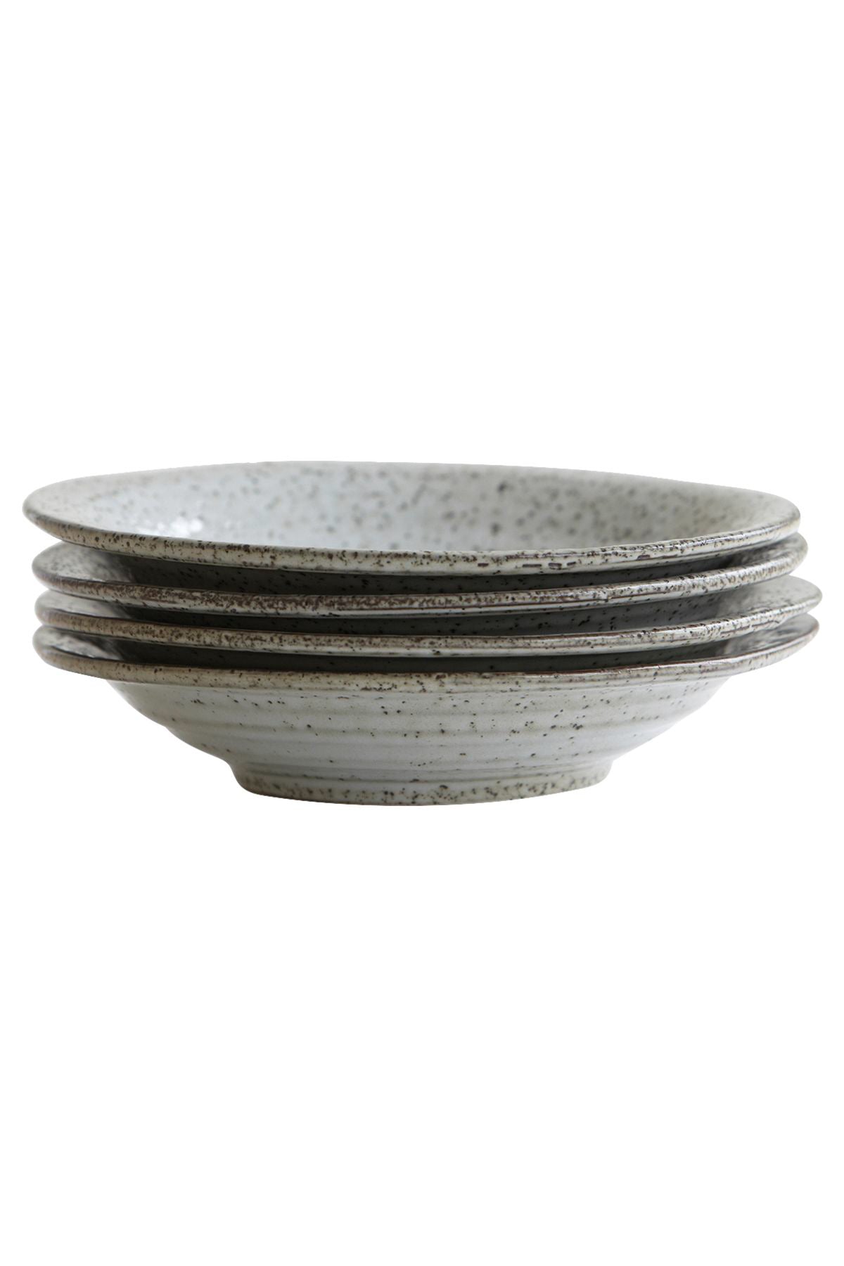 Stock image of four rustic pasta bowls piled on top of each other against a white background.